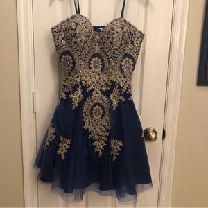 Navy dress with gold embroidery. New with tags.